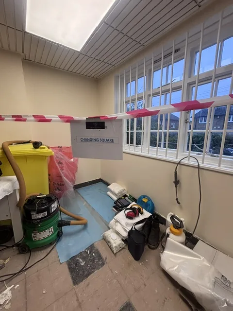 Asbestos floor tile and bitumen removal in Forest Gate